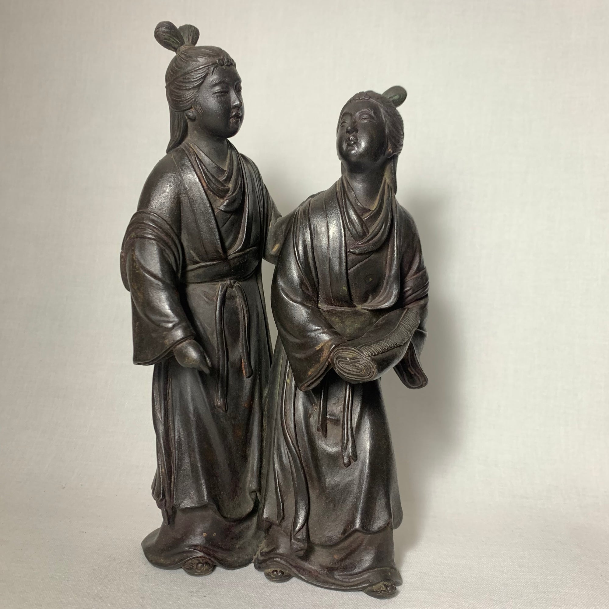 A Japanese Bronze Okimono, Finely Cast and Superbly Finished with a Lustrous Black Polish.
