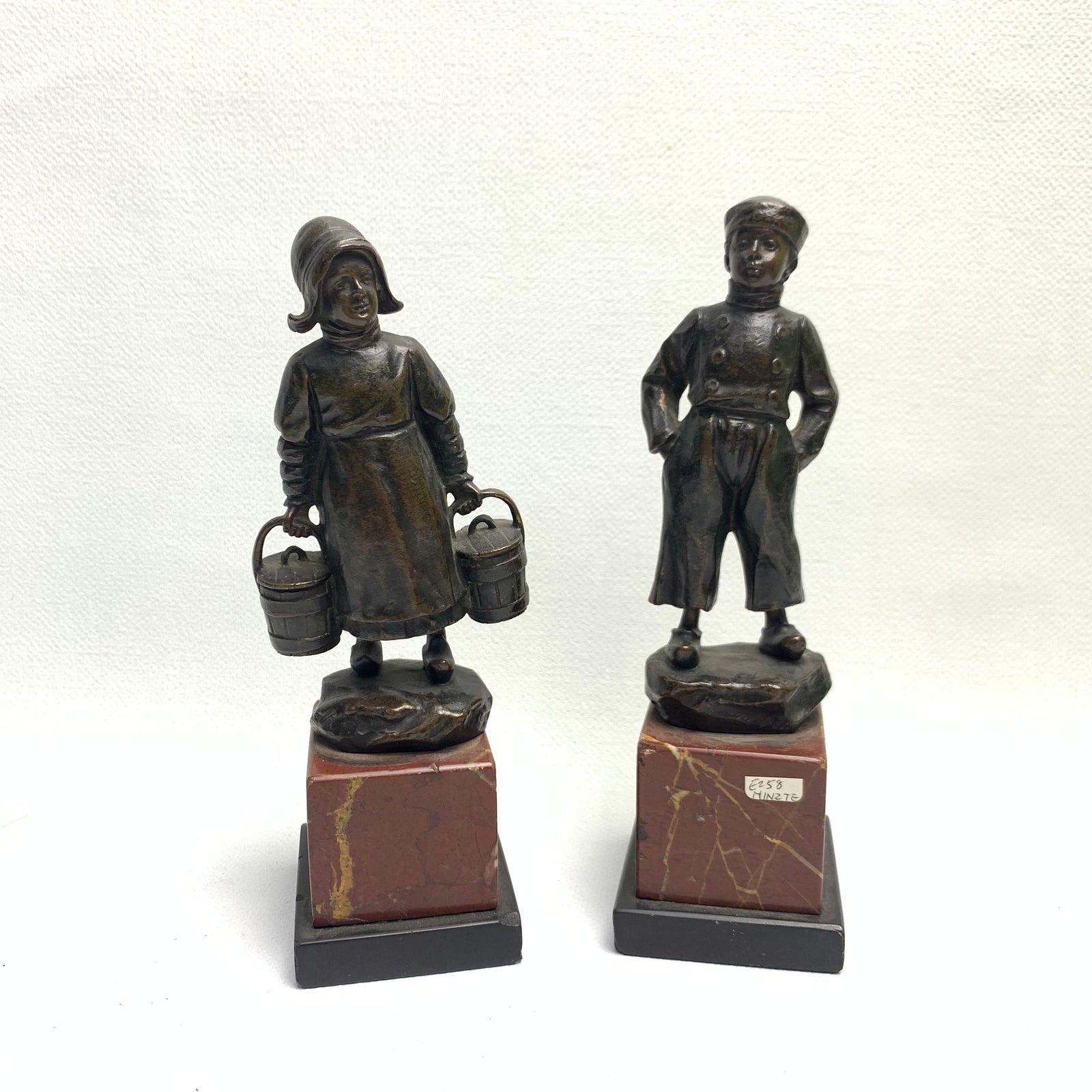 A Pair of Bronze Sculptures