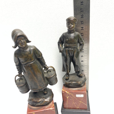 A Pair of Bronze Sculptures