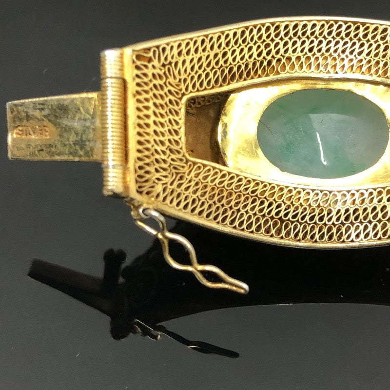 Sold at Auction: Art Nouveau openwork gilt bangle bracelet with peridot?  green crystal stones and mushrooms motif. 3/4